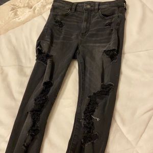 stretchy black ripped american eagle jeans